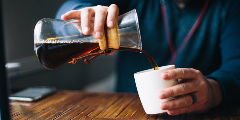 Pouring Coffee on a cup
